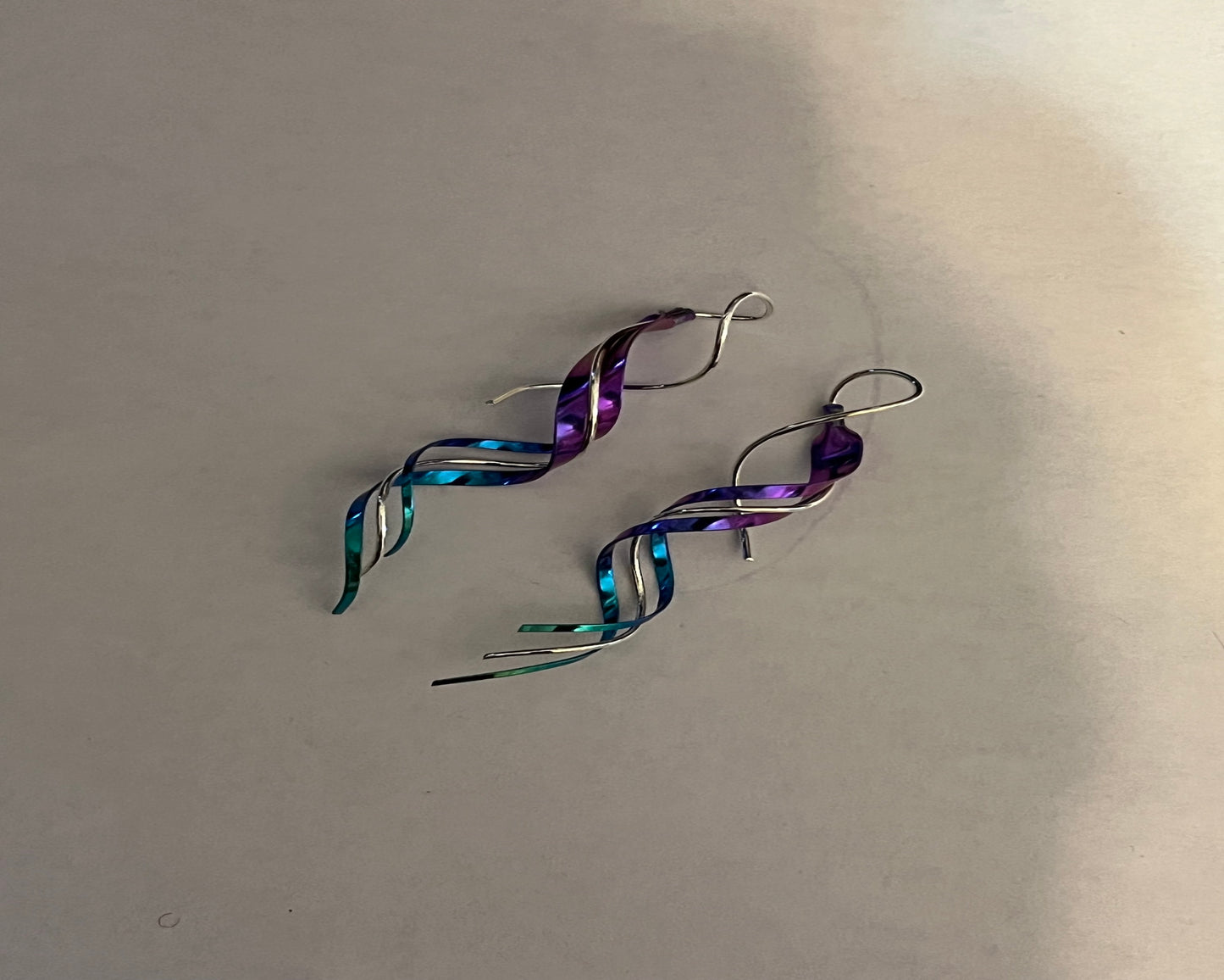 Earrings - Long Titanium and Sterling Silver swirl earrings. 2.25 inches long
